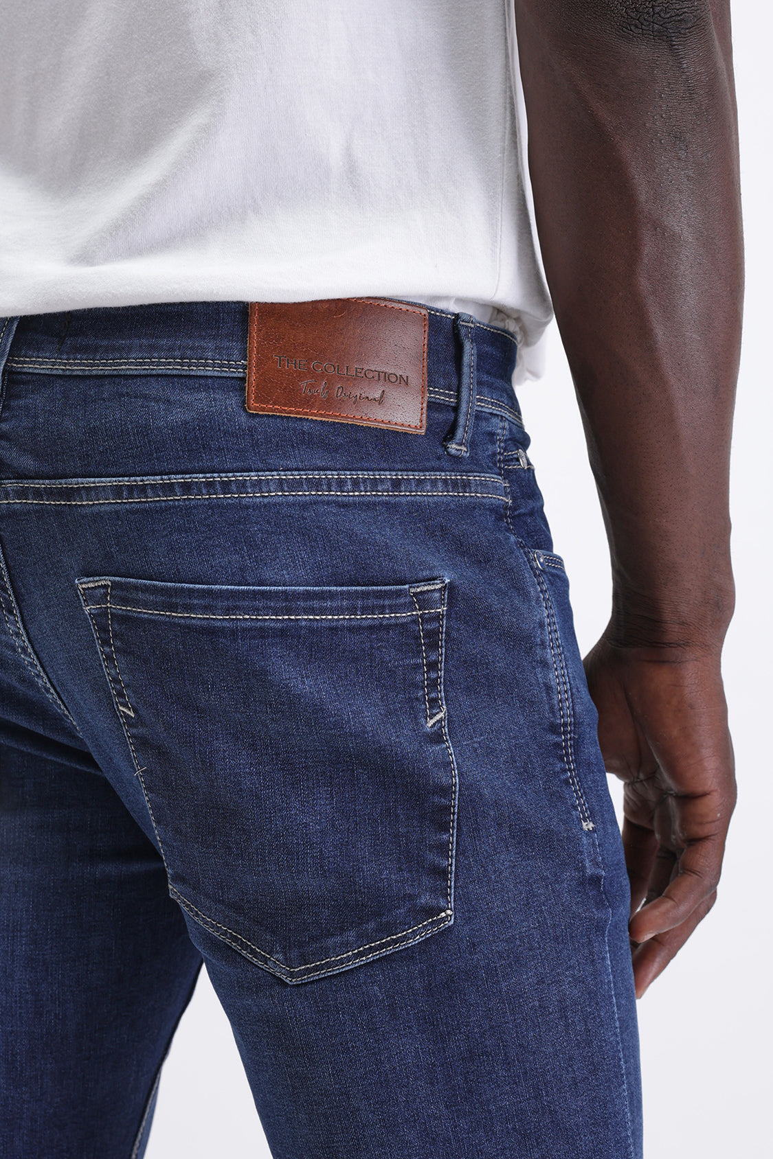 SLIM FIT MID WASH JEANS